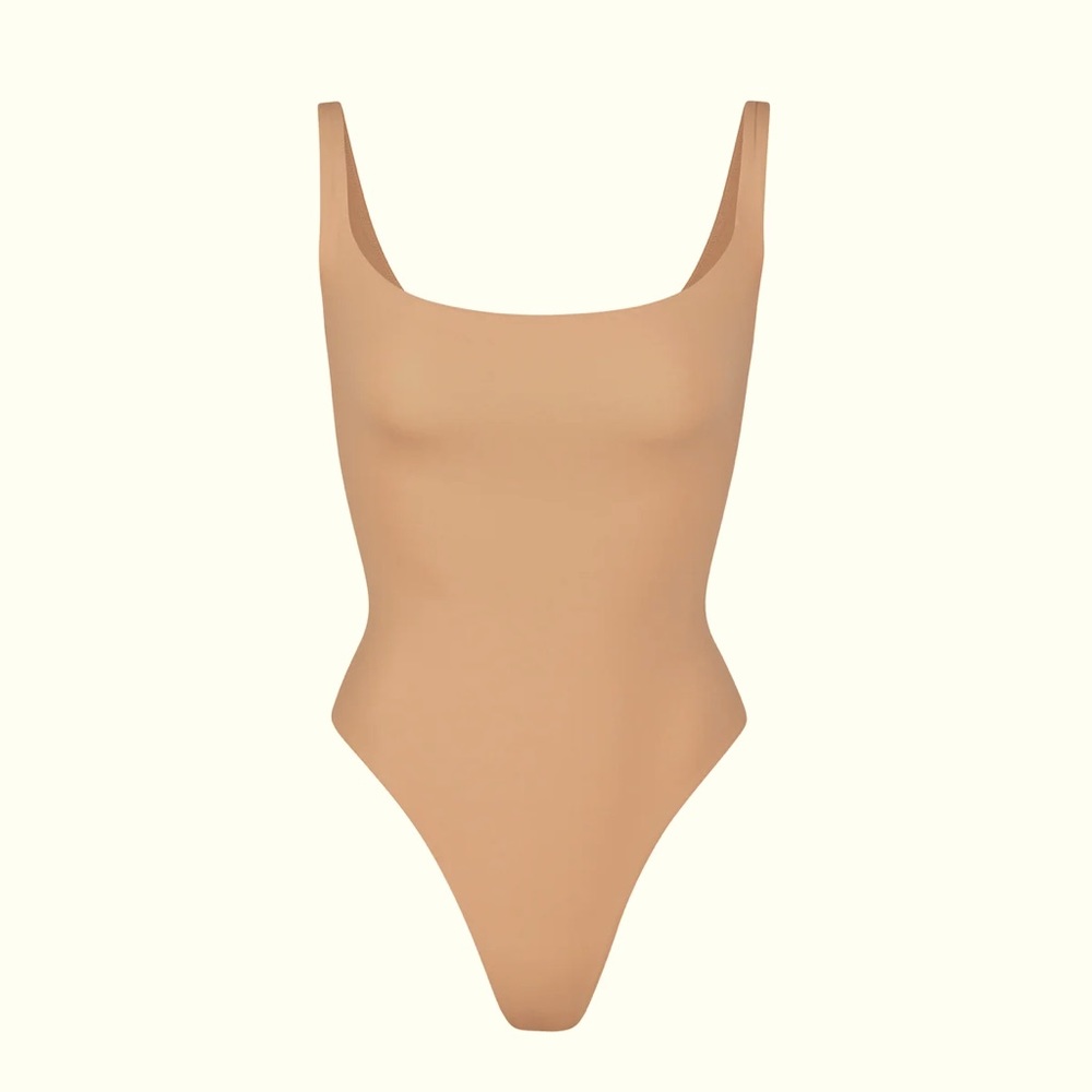 SKIMS:  Fits everybody square neck bodysuit. Size S/M